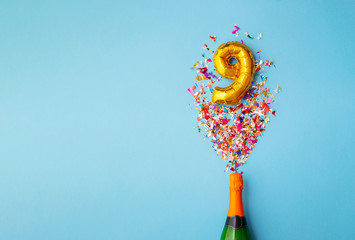 9th anniversary champagne bottle balloon pop