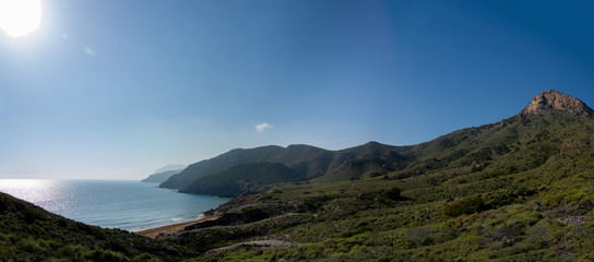 Green mountains and sandy beaches of regional park of Calblanque, Monte de las Cenizas and Peña del Aguila in Spain