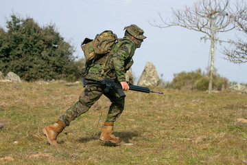 Soldier of the ground army running to take refuge