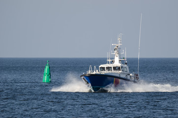 BORDER GUARDS - A fast boat in action at sea