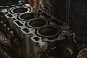 car engine repair by a specialist in service