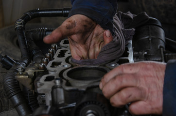 car engine repair by a specialist in service