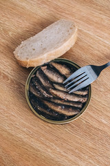 Canned sprats in butter and bread