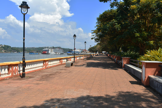 a small walk lane beside river mandovi in Goa with vintage light poles in Goa