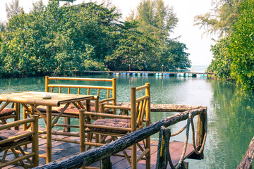 Fototapeta premium wooden arbor on the water