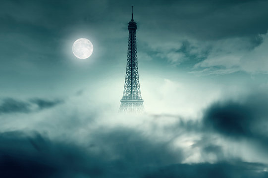 Night With Moon And Eiffel Tower In Paris 