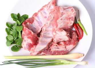 Fresh pork ribs on white background
