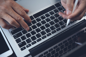 Working on laptop computer