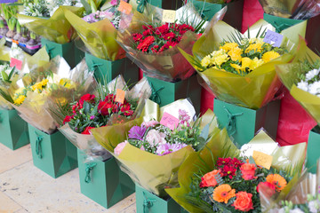 Street sale of flower bouquets near metro station.Roses,tulips, carnations,lilies,gypsophila,hyacinths,chrysanthemums. Selling for Valentine's Day on February 14, International Women's Day on March 8