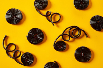 Coiled spirals of liquorice with trailing strands
