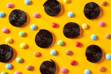 Coiled spirals of liquorice with chocolate candy