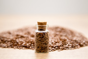 flax seeds on wooden background