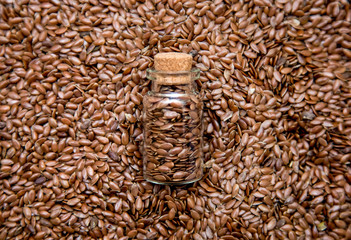 flax seeds on wooden background