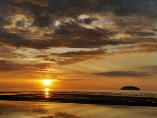 Fototapeta na wymiar Beautiful Sunset view in Tanjung Aru Beach, Kota Kinabalu. Sabah, Malaysia. Borneo. The Land Below The Wind.