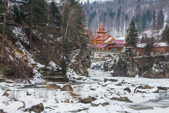 View of the frozen Prut mountain river in the Carpathian village of Yaremche. Ukraine