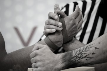 Participants of a tournament on Arm wrestling