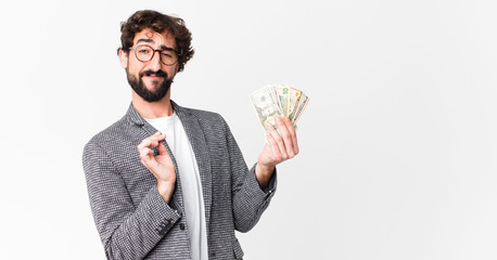 young crazy bearded man with dollar banknotes