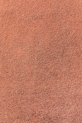 Texture of red stuccoed wall