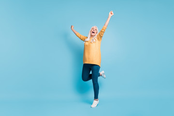 Fototapeta na wymiar Full length body size view of her she nice attractive lovely cheerful cheery ecstatic dreamy lucky grey-haired woman celebrating having fun isolated on bright vivid shine vibrant blue color background