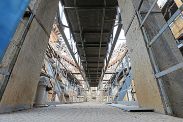 Unused and abandoned metal pipes in factories