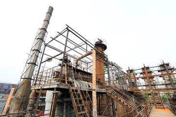 Unused and abandoned metal pipes in factories