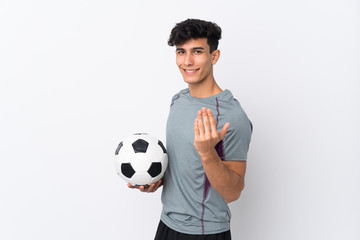 Argentinian football player man over isolated white background inviting to come with hand. Happy that you came