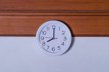 clock on a wood background