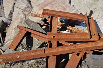 rusted iron and rock boulders