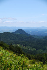 Fototapeta na wymiar Mt. Sasakura in early summer. View east from Mt. Izumigatake. Sendai, Miyagi, Japan.
