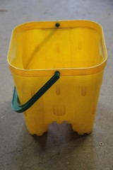 Yellow sand castle plastic bucket