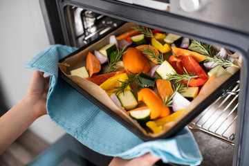 Close Up Of Roasting Tray Of Vegetables For Vegan Meal In Oven