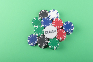 poker chips and cards - green background