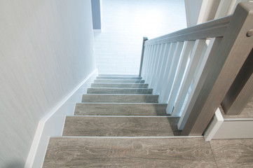 Fototapeta premium Wooden stylish staircase in the house. Interior.