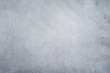 Texture of a smooth gray concrete wall as a background