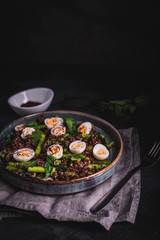 Quail eggs red quinoa and asparagus salad moody food photography