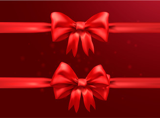 silk red bow on light red background bright and rich color