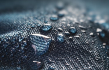 Many water drops on waterproof impregnated textile. - obrazy, fototapety, plakaty