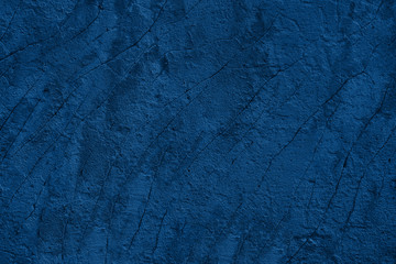 blue shabby stucco background with cracks