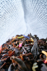 Inside a tea bag herbal tea on a light background