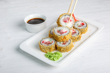 Deep fried Japanese spring roll . wand also features a Traditional Japanese menu on a white background