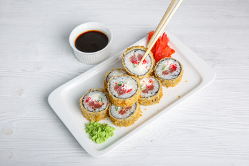 Deep fried Japanese spring roll . wand also features a Traditional Japanese menu on a white background