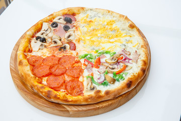 Italian pizza of four flavors