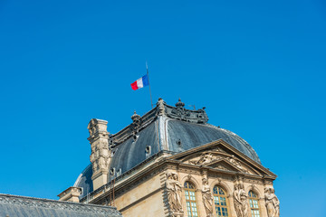 Obraz premium French flag in Paris city, France.