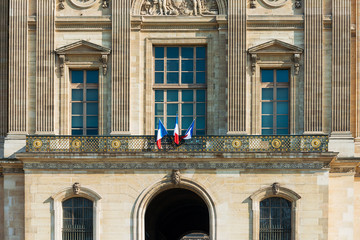 French flag in Paris city, France.