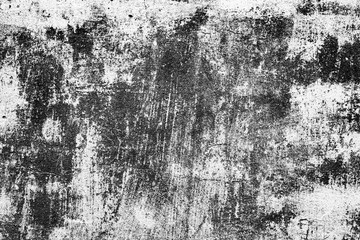 Texture of a concrete wall with cracks and scratches which can be used as a background