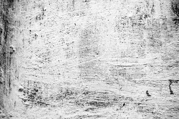 Texture of a concrete wall with cracks and scratches which can be used as a background