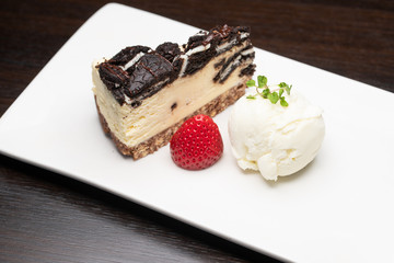 Chocolate cake with ice cream and strawberry