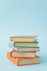 Many books on color background