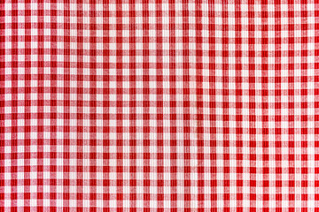 Red and white abstract checkered background, tablecloth, repeating fabric texture