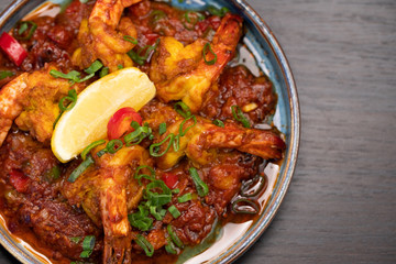 Indian food - chilli garlic prawns with herbs and spices 